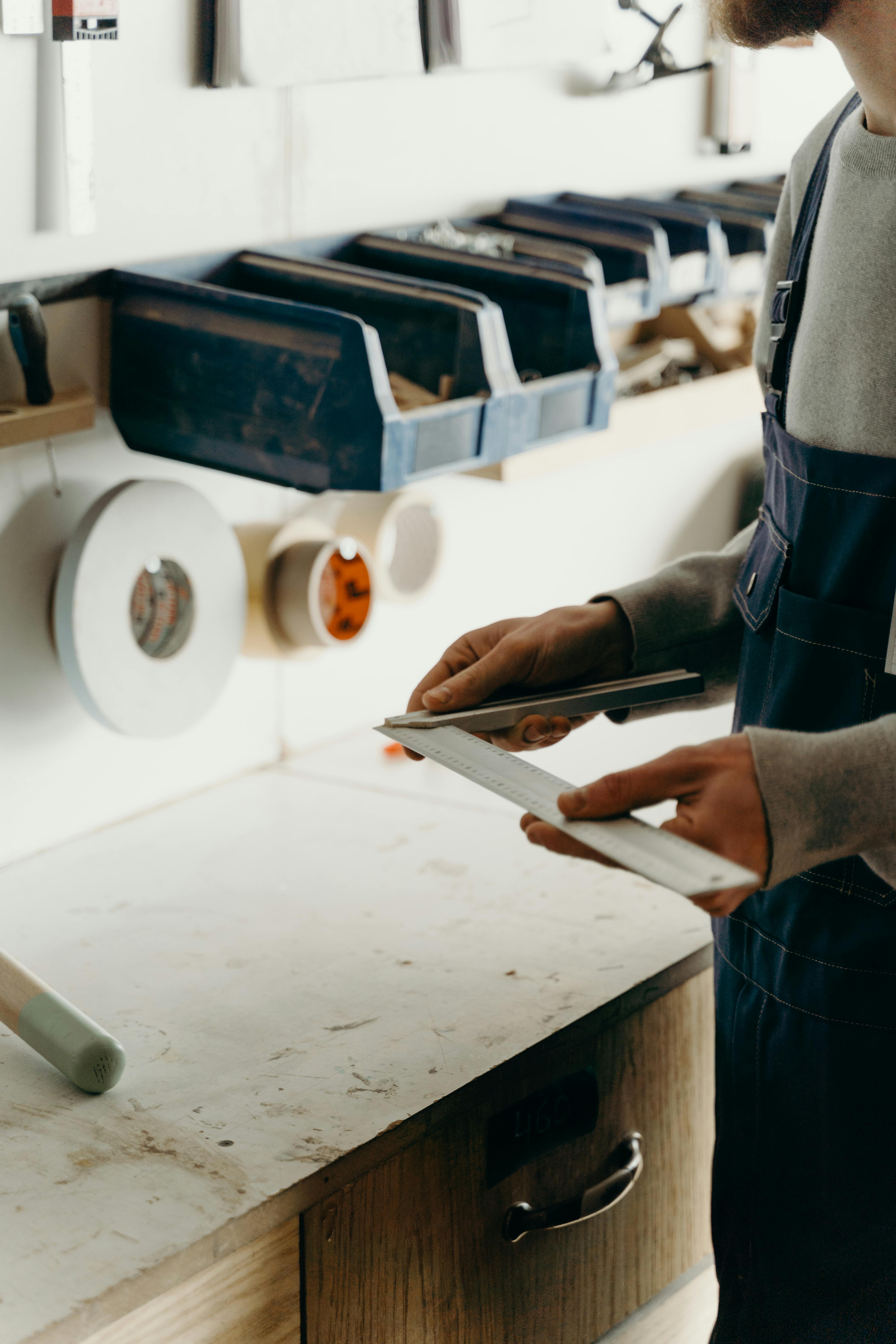 a person holding an angle ruler