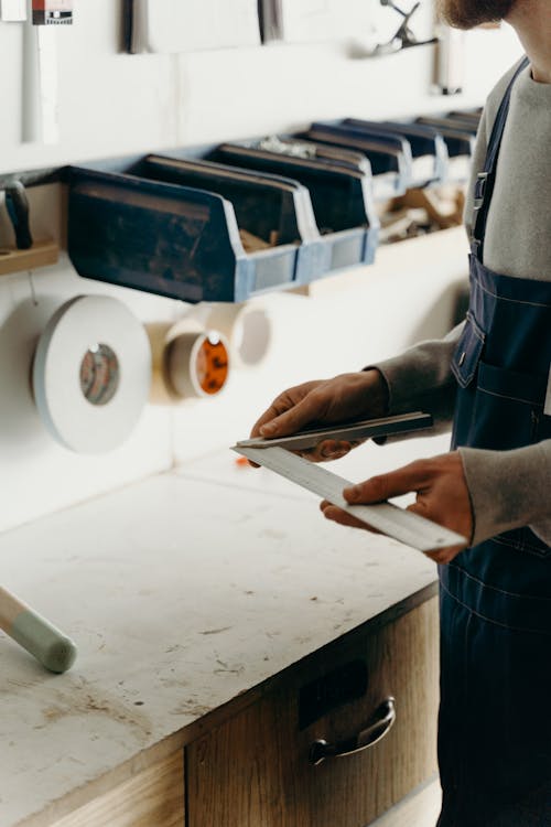 A Person Holding an Angle Ruler