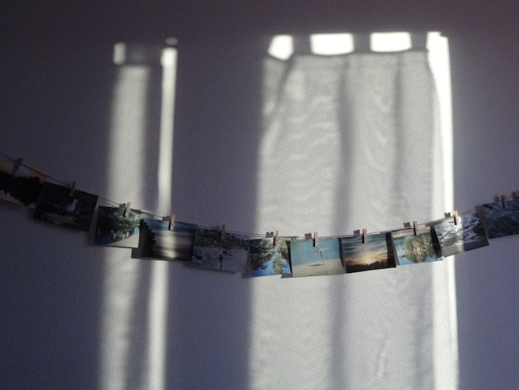Photos Hanging On Clothes Line