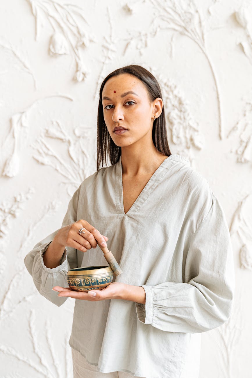 Woman with Singing Bowl for Meditation