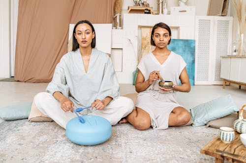 Women Sitting on the Floor