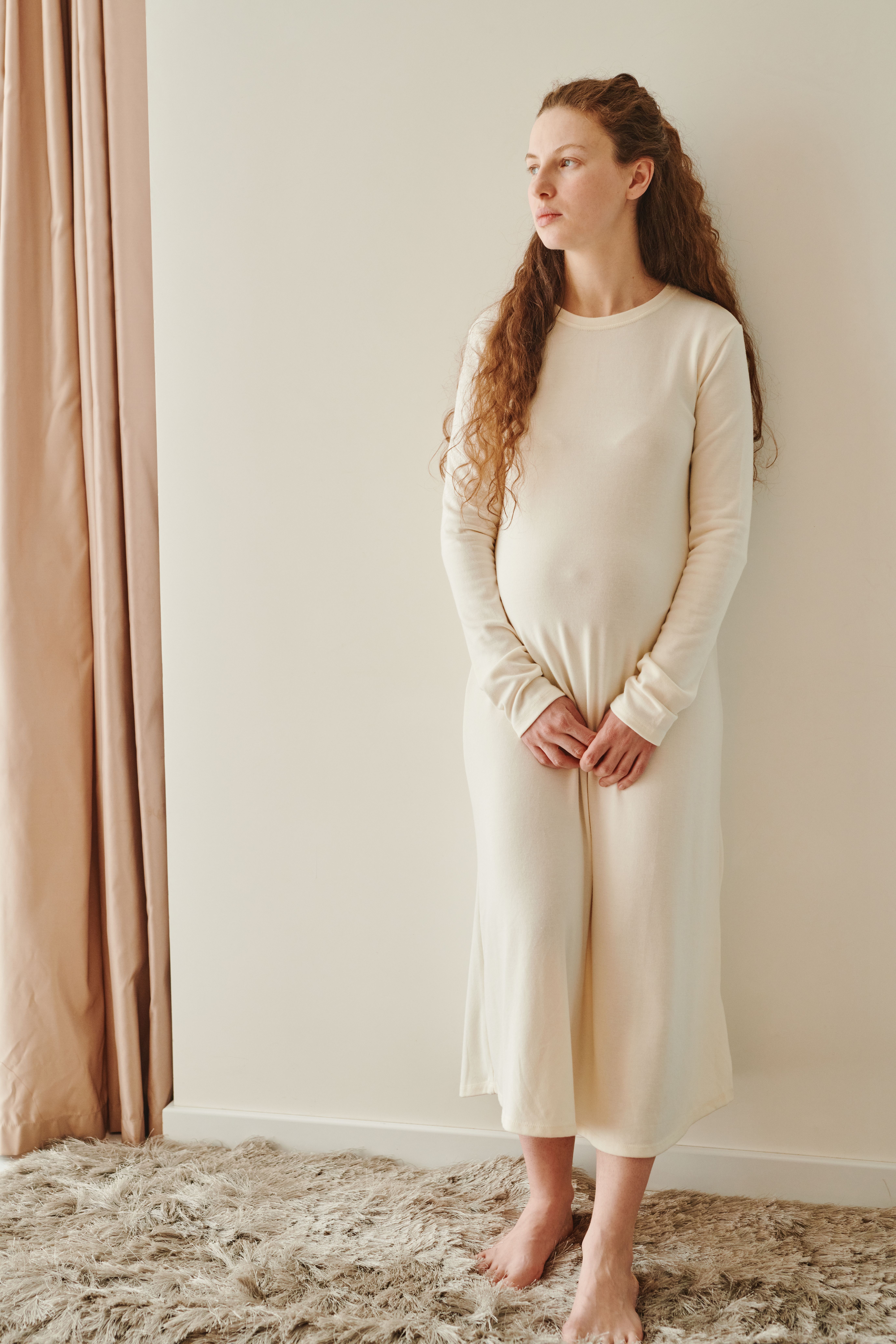 A Woman in White Long Sleeve Dress · Free Stock Photo