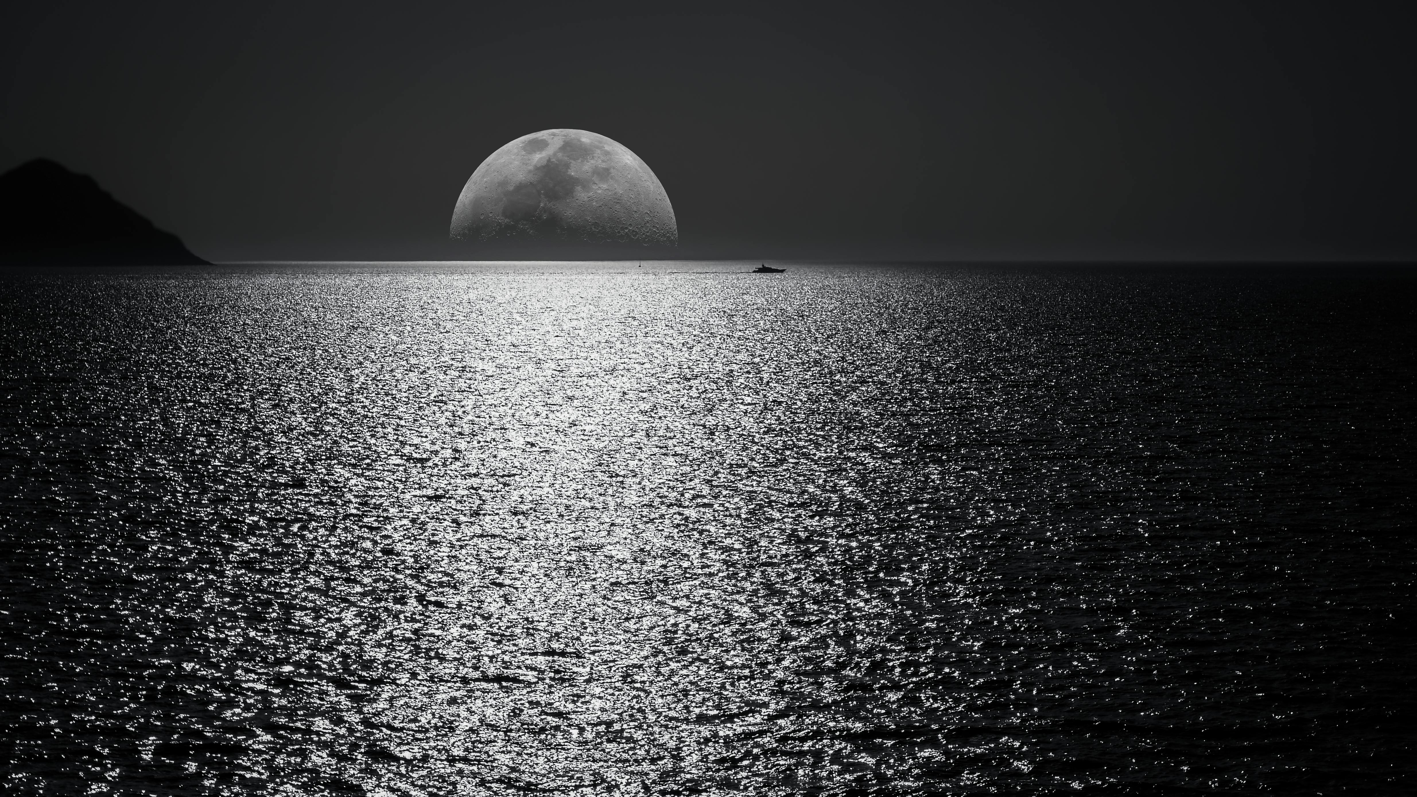 White and Black Moon With Black Skies and Body of Water Photography during  Night Time · Free Stock Photo