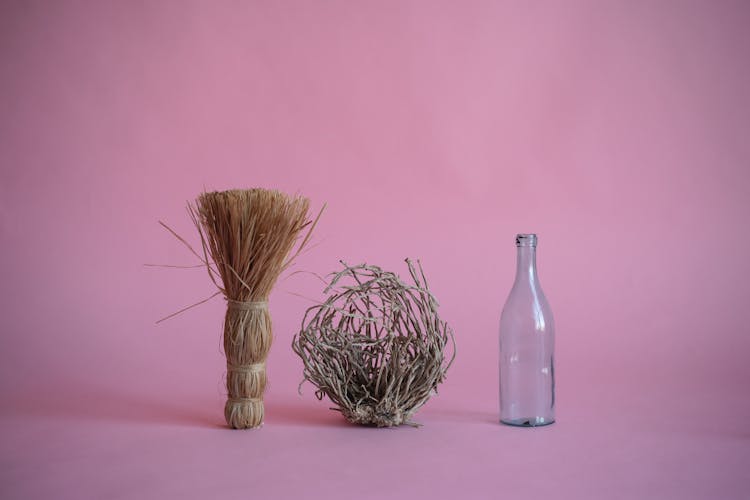 Bottle, Hay Bundle And Branches