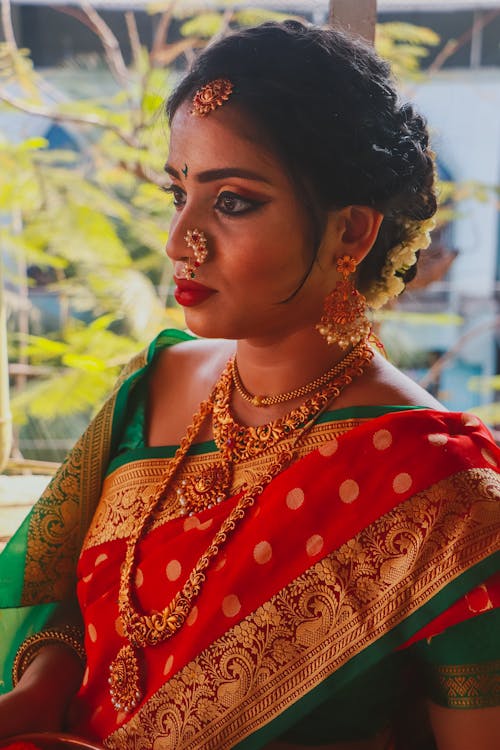 Woman in Red and Green Sari