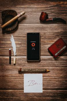 Space Gray Iphone 6 on Brown Wooden Table