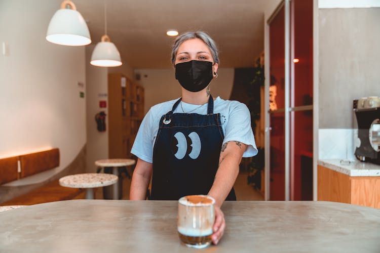 Photo Of Barista Serving Iced Coffee