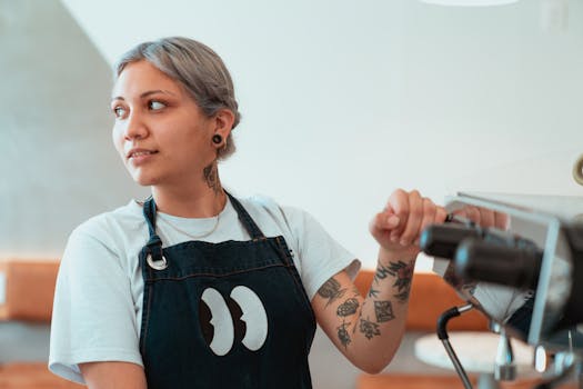 A young female barista working with enthusiasm in a stylish cafe, creating quality coffee.