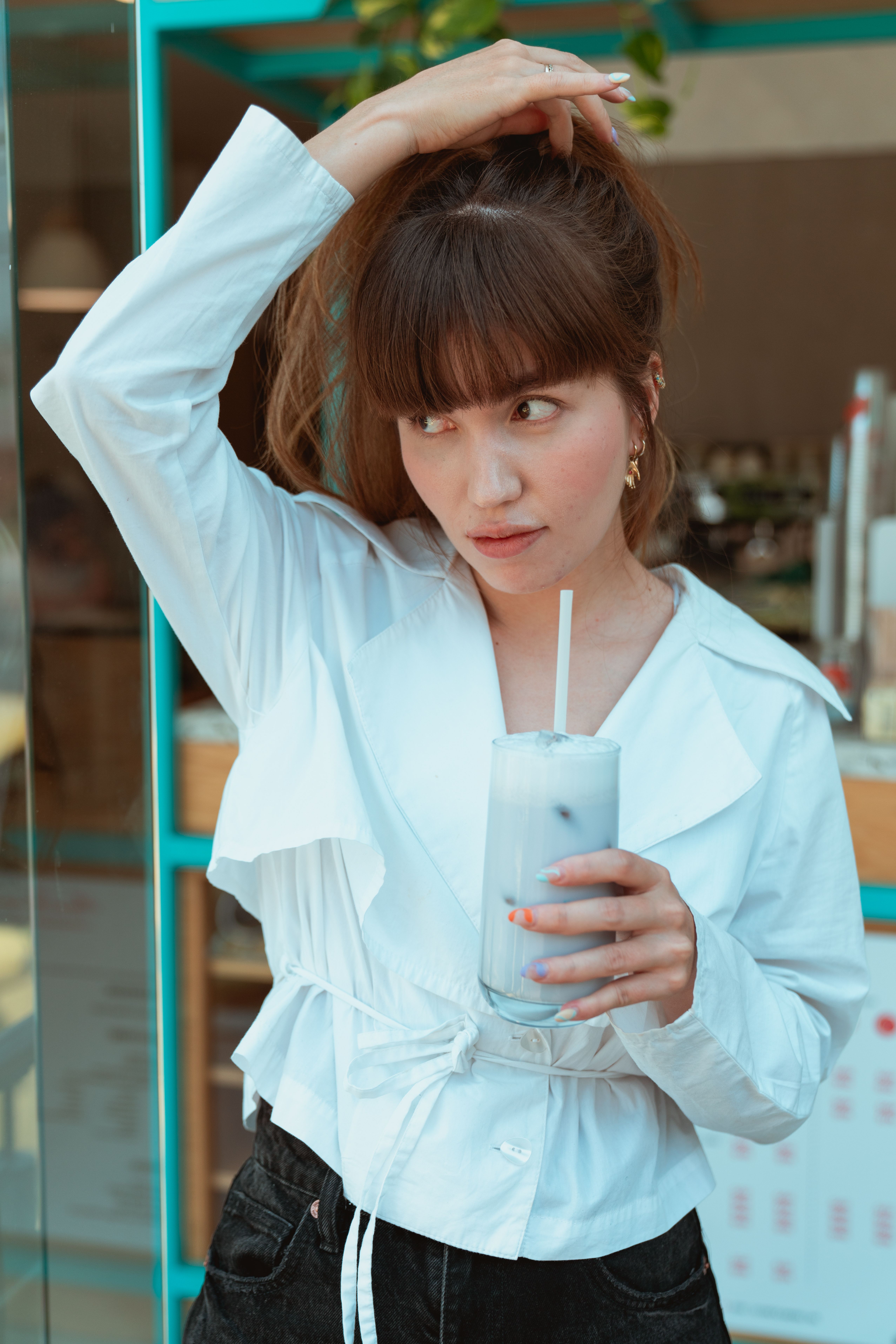 A Woman in White Long Sleeve Shirt · Free Stock Photo