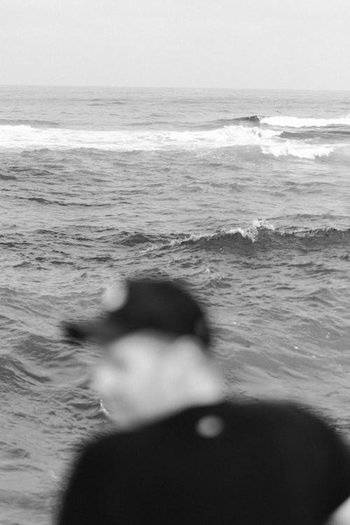 Grayscale Photo of Crashing Waves