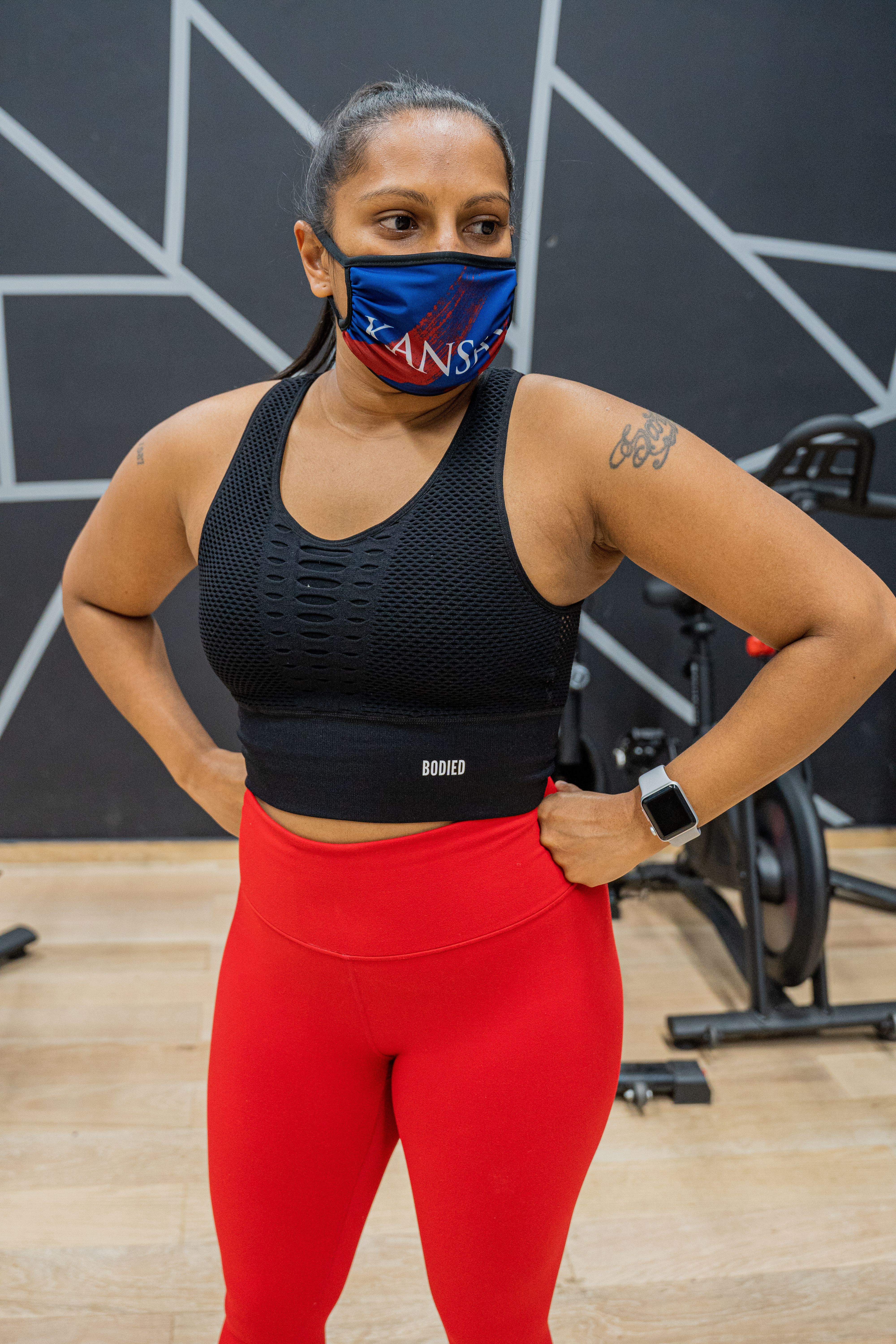 Woman in Black Sports Bra and Red Leggings · Free Stock Photo