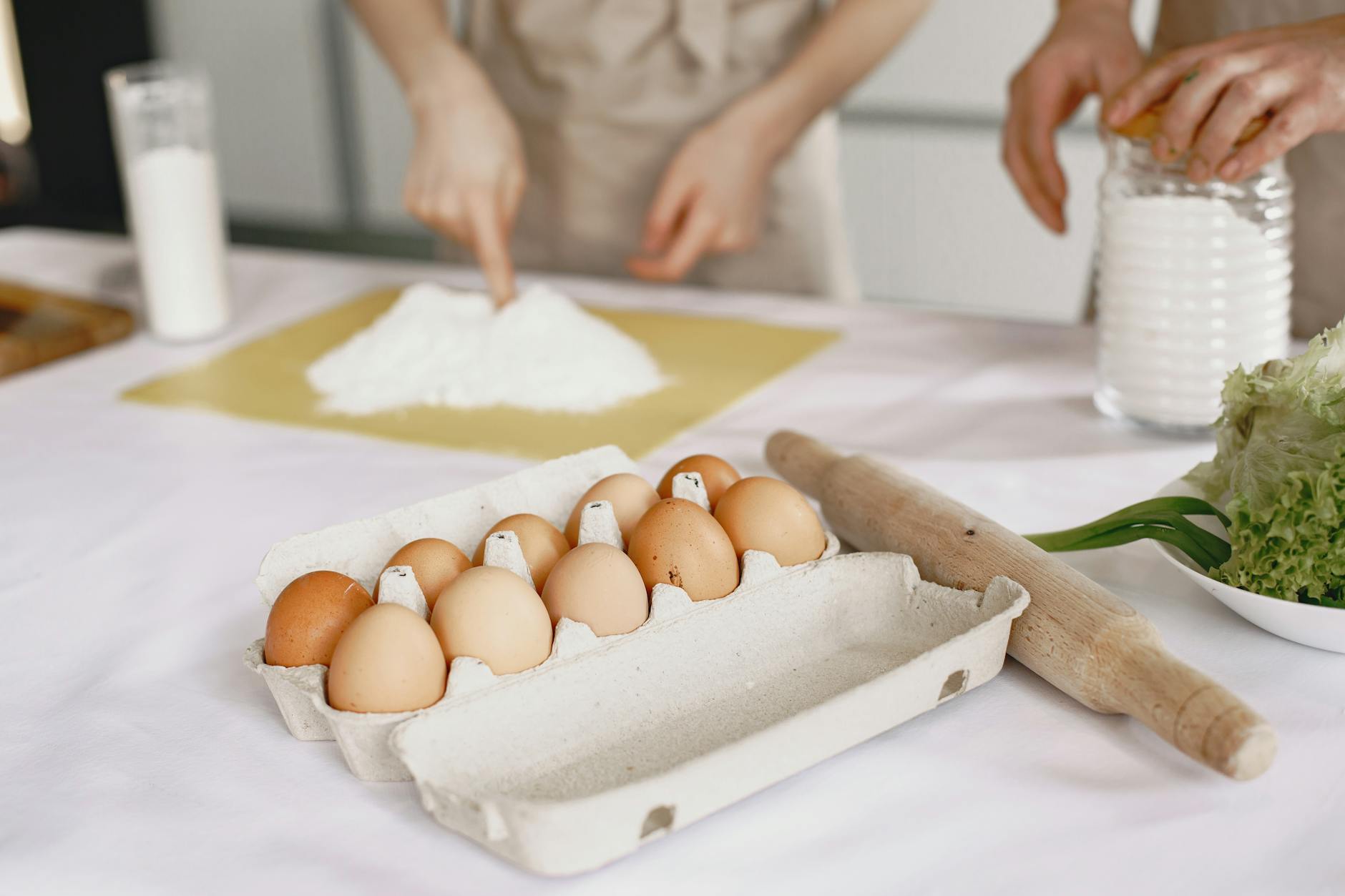 Eggs In A Kitchen Setting With Vegetables And Grains