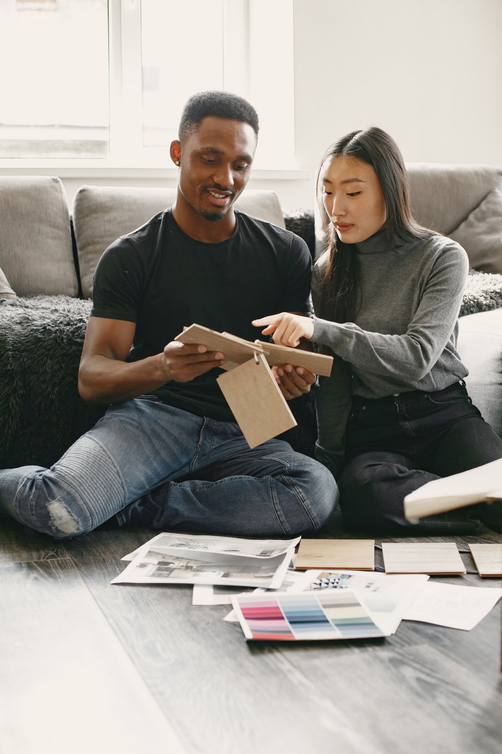 husband on board with decorating living room