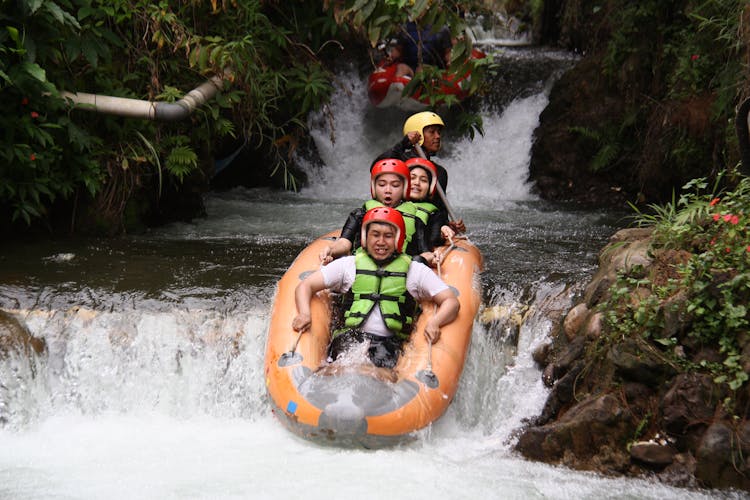 People Water Rafting