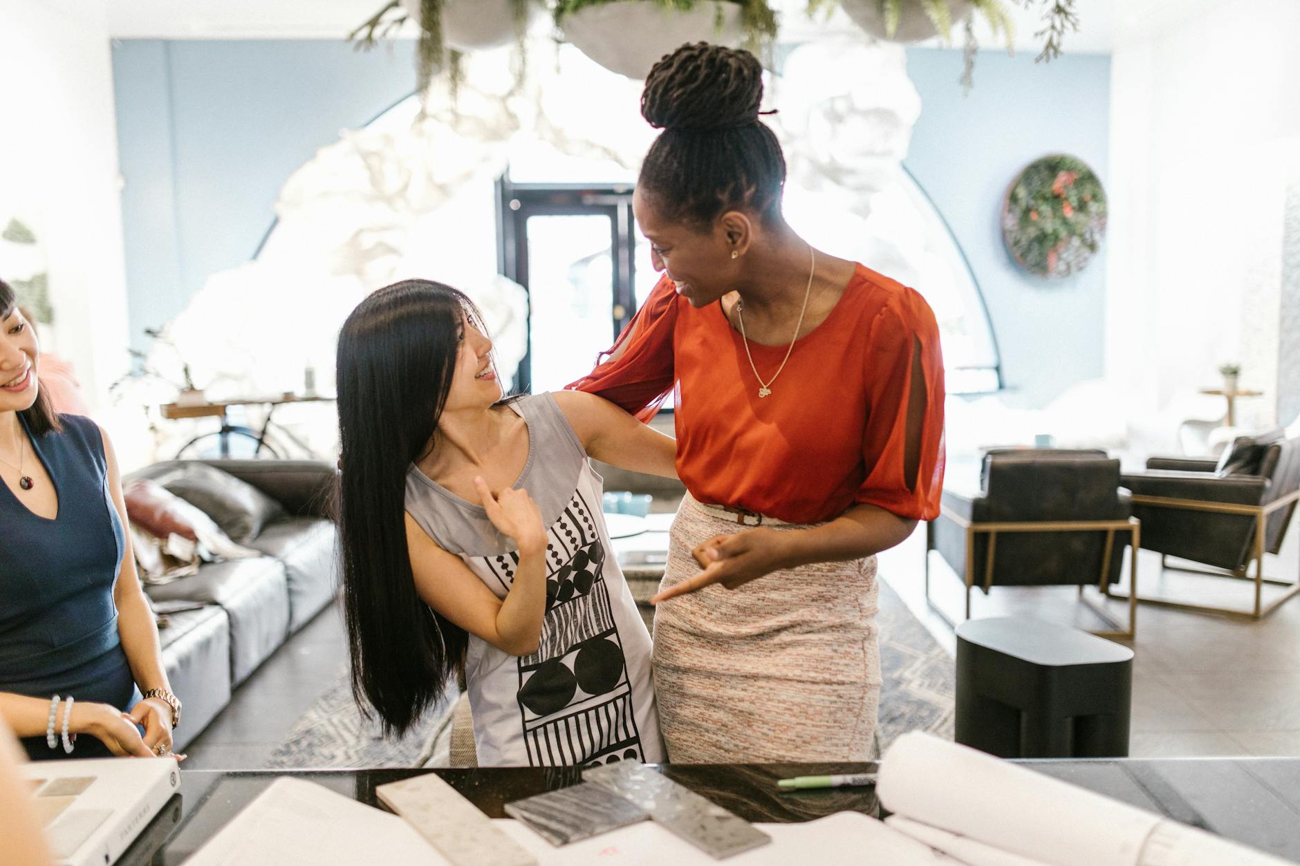 Women Smiling while Looking at each other