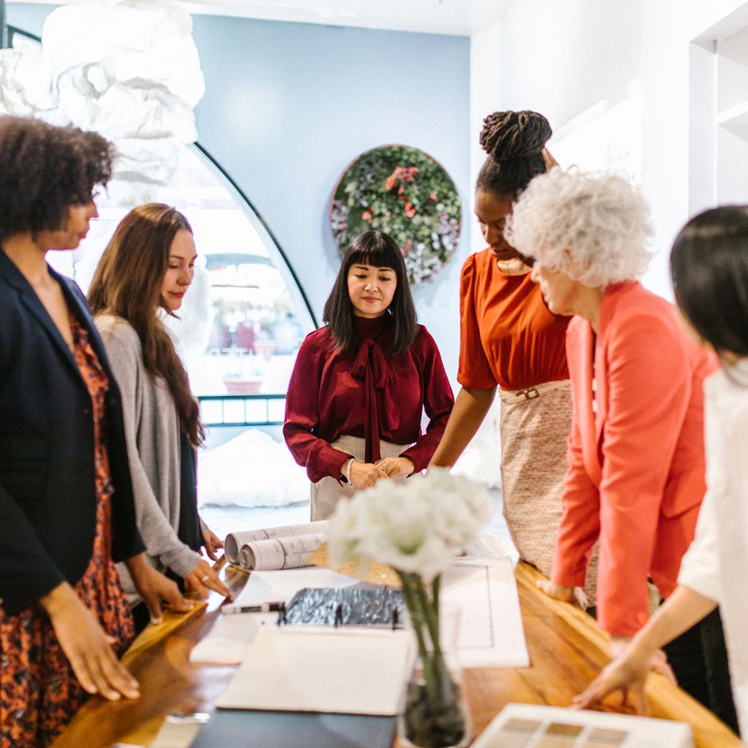 Women leaders in a collaborative group session