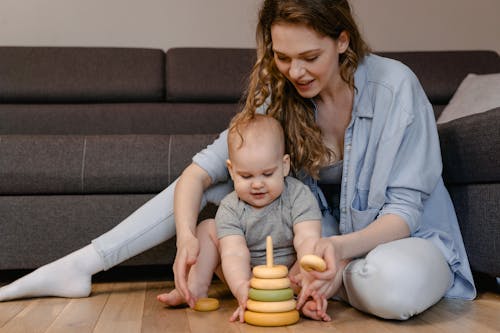 Free Mother and Baby Playing Together Stock Photo