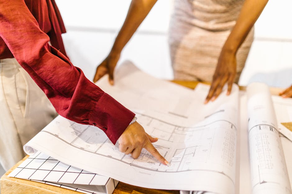 Women Looking at a Floor Plan 