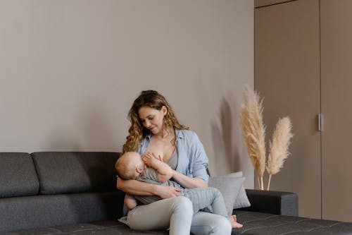 Free Mother Breastfeeding her Child Stock Photo