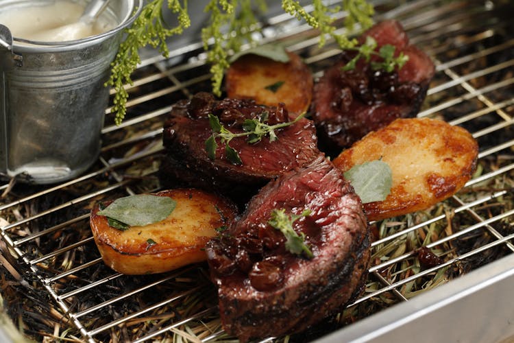 Photograph Of Roasted Beef With Potatoes