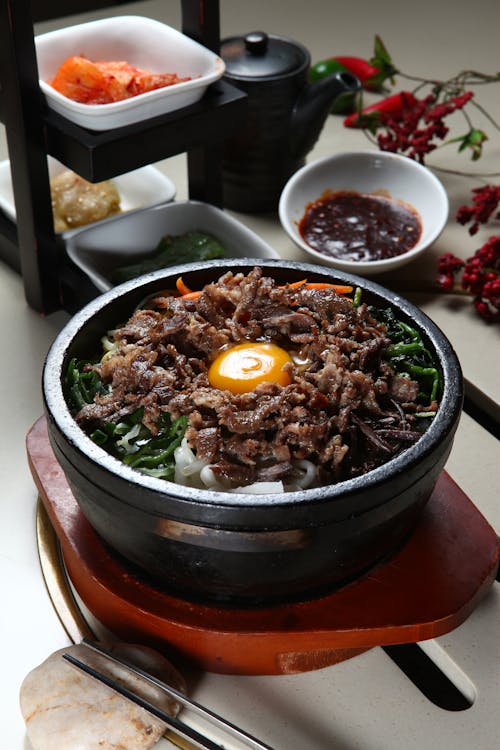 Bibimbap on Black Ceramic Bowl