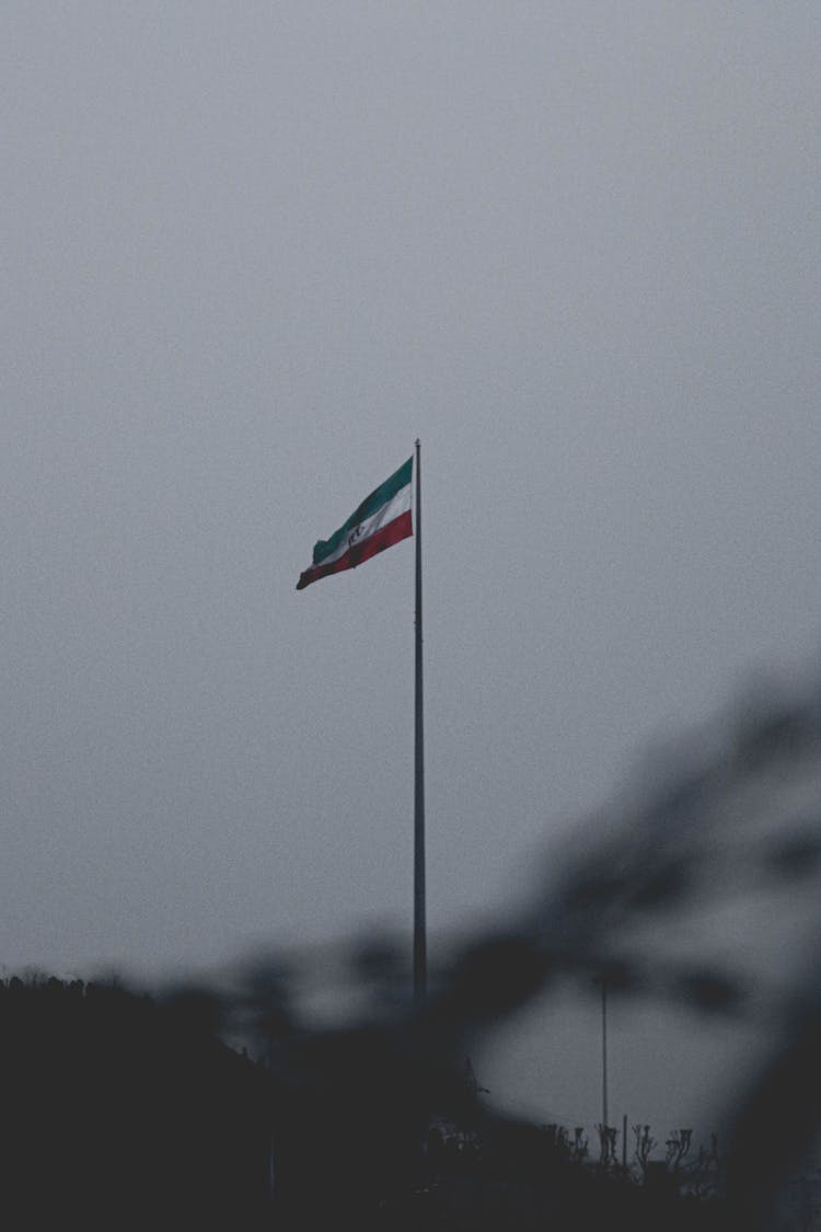 Iran Flag On Flagpole 