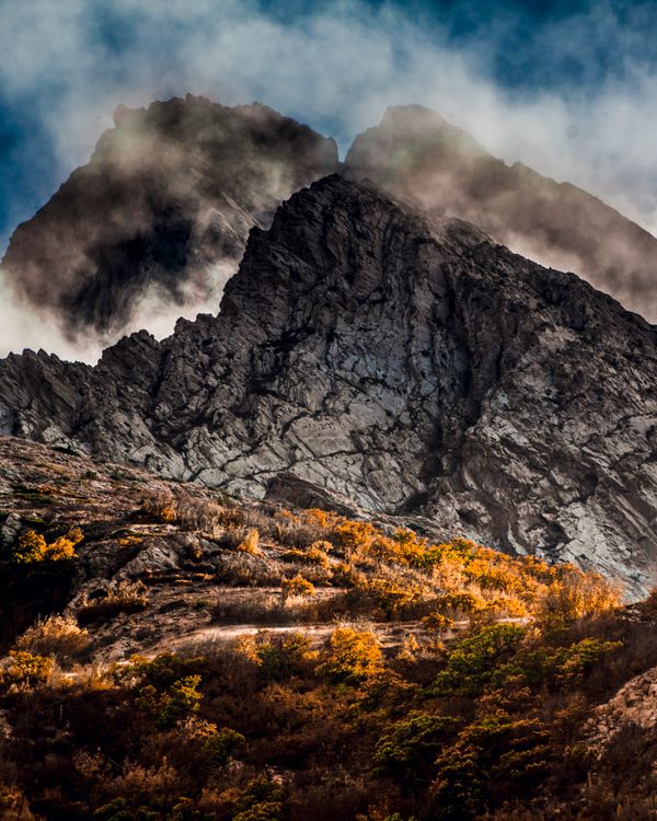 Rocky Mountain Under White Clouds · Free Stock Photo