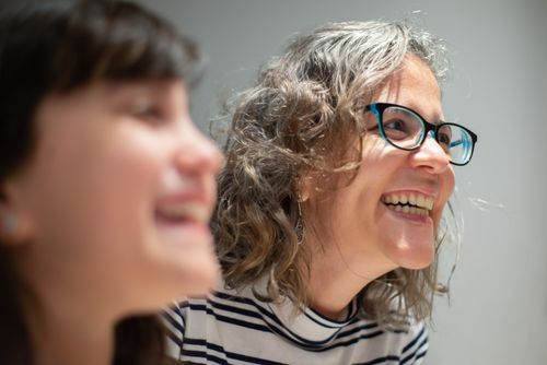 Free Close-up of two women sharing a joyful moment indoors, captured in Portugal. Stock Photo
