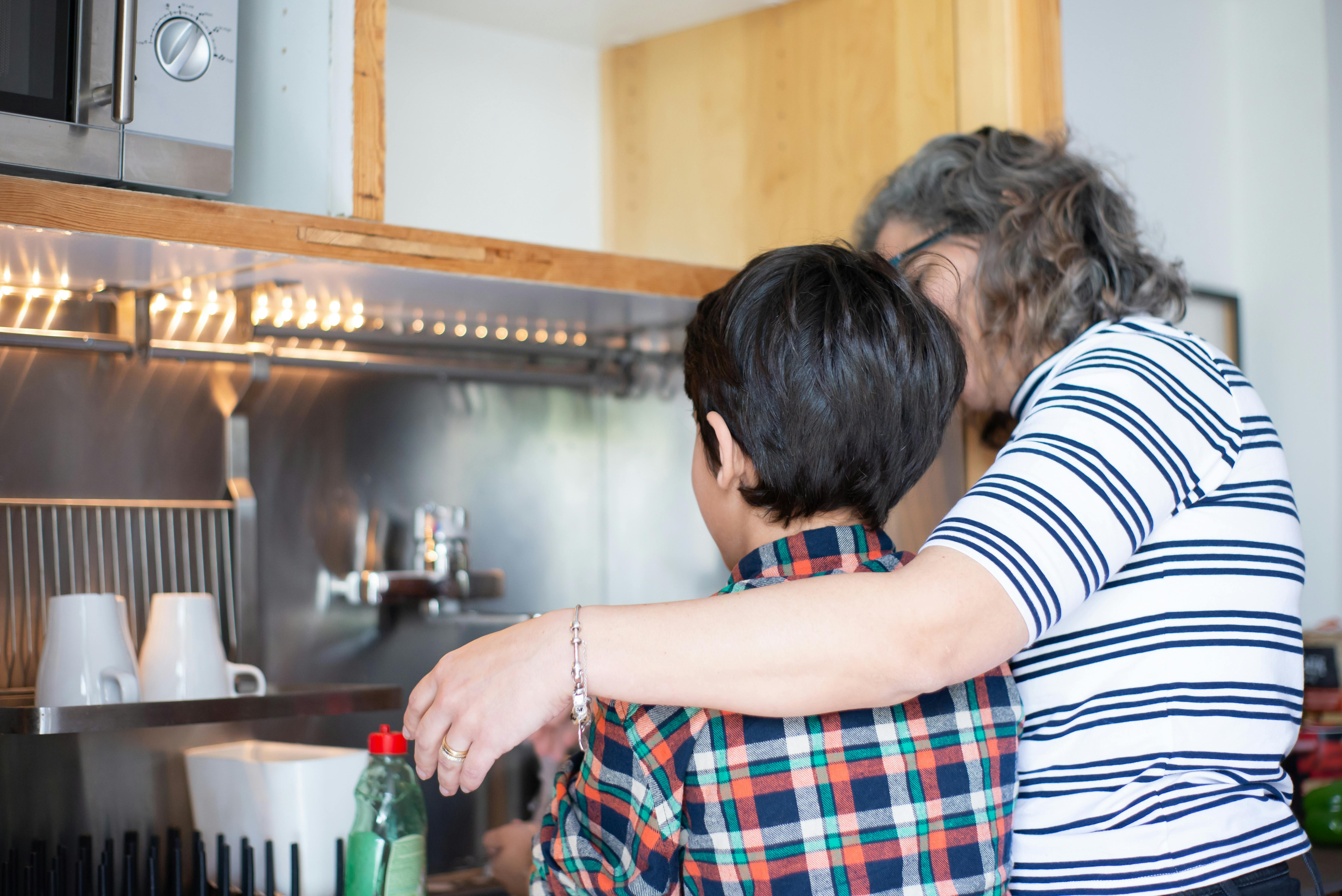 mother with his child in the kitchen