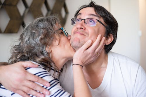 Free A Romantic Couple Kissing Stock Photo