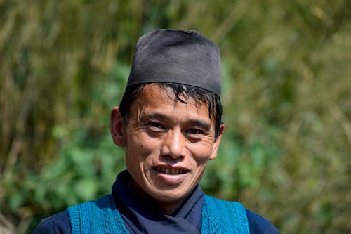 Free A Man Wearing a Black Kufi Hat Stock Photo