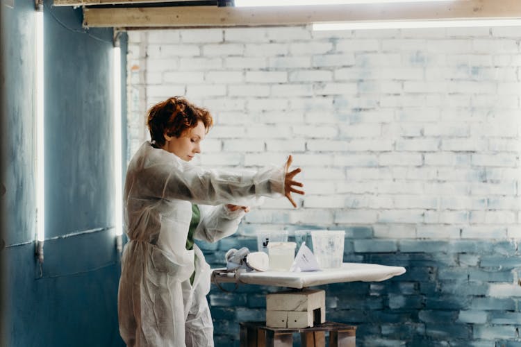 Woman Crafting Liquids In A Lab