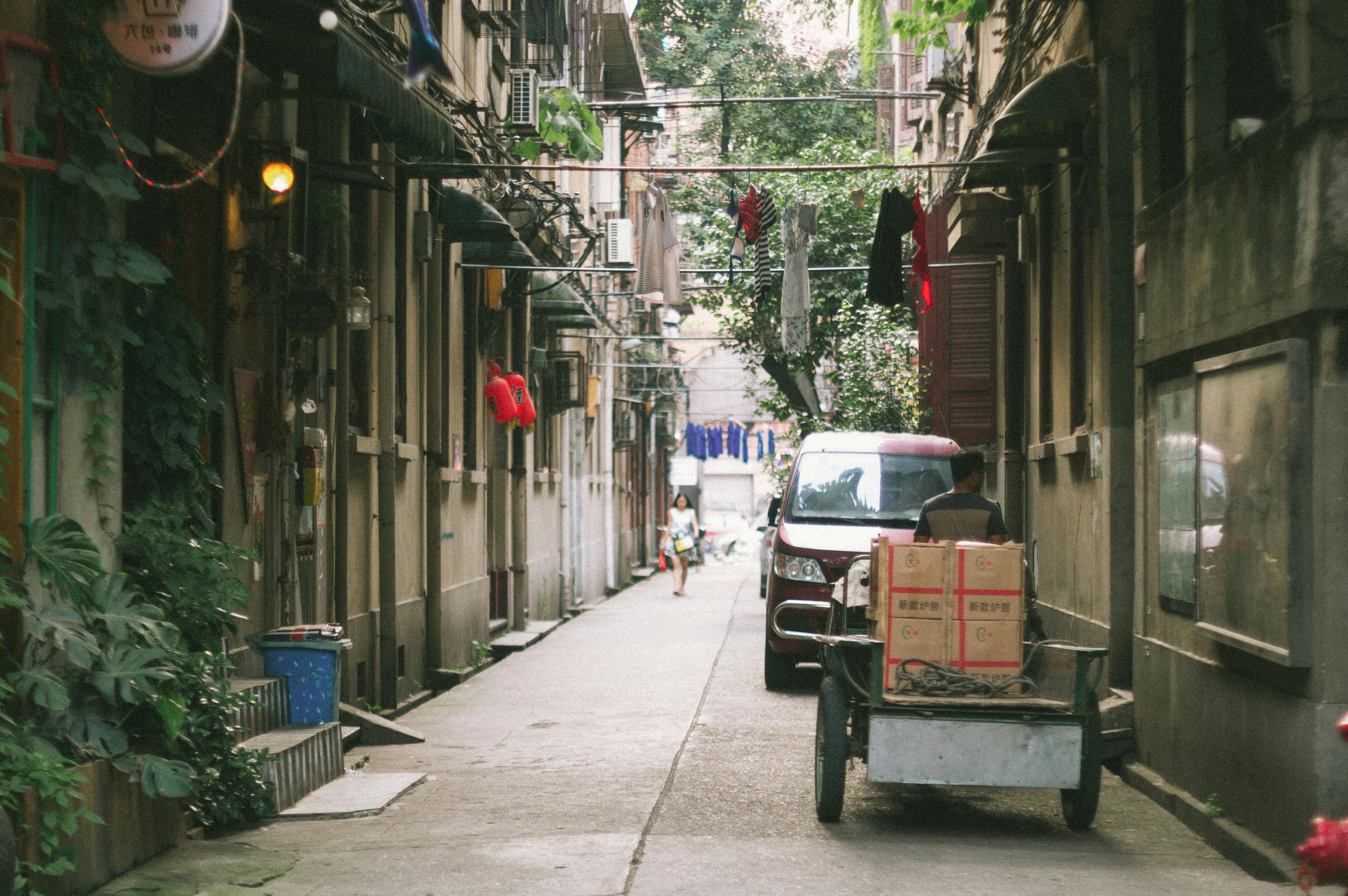 an alley between buildings in asia