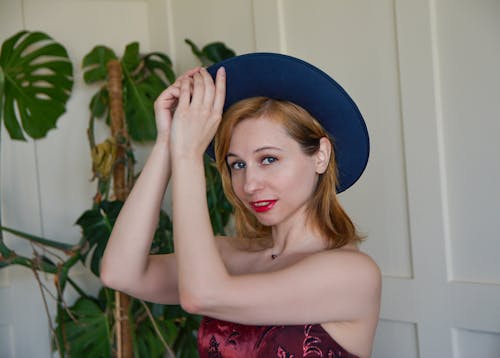 Stylish woman in blue hat