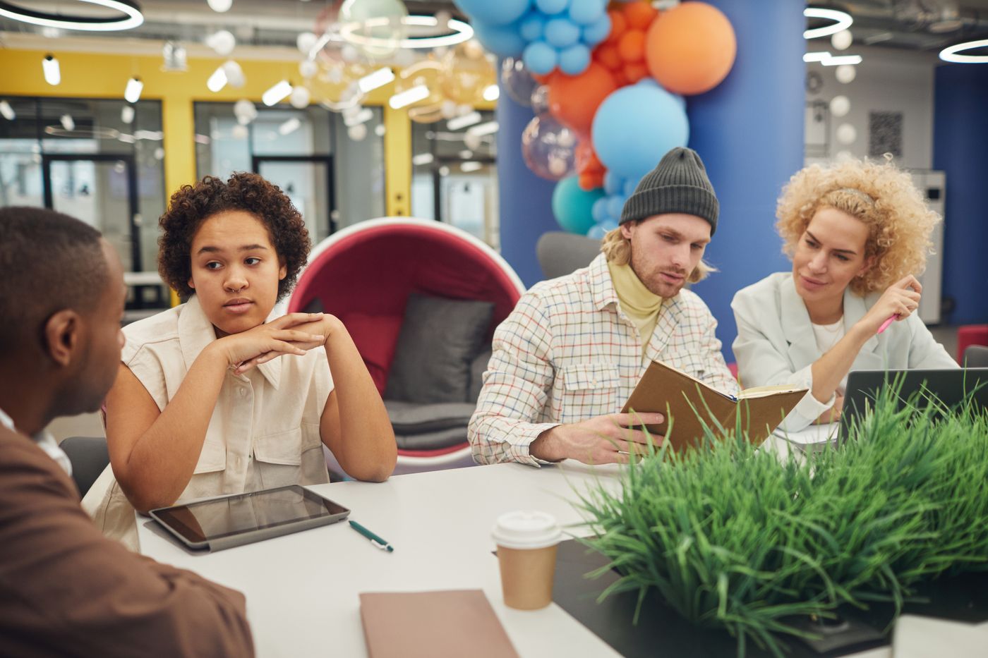 Creative team working together in a bright modern workspace