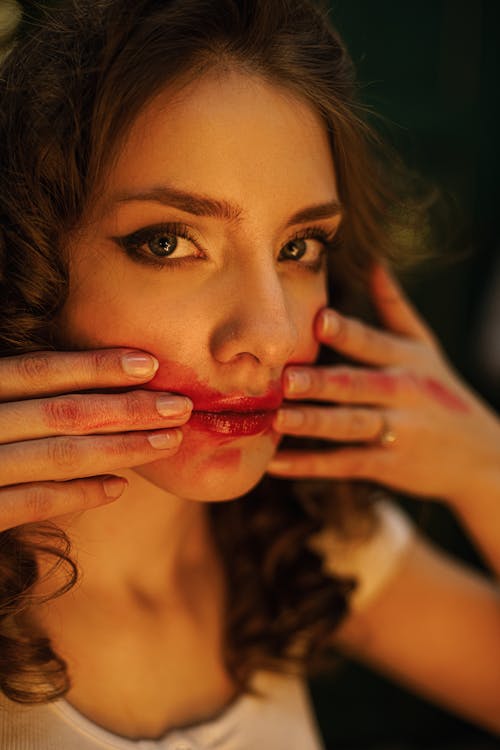 Woman With Beautiful Eyes Touching Her Face