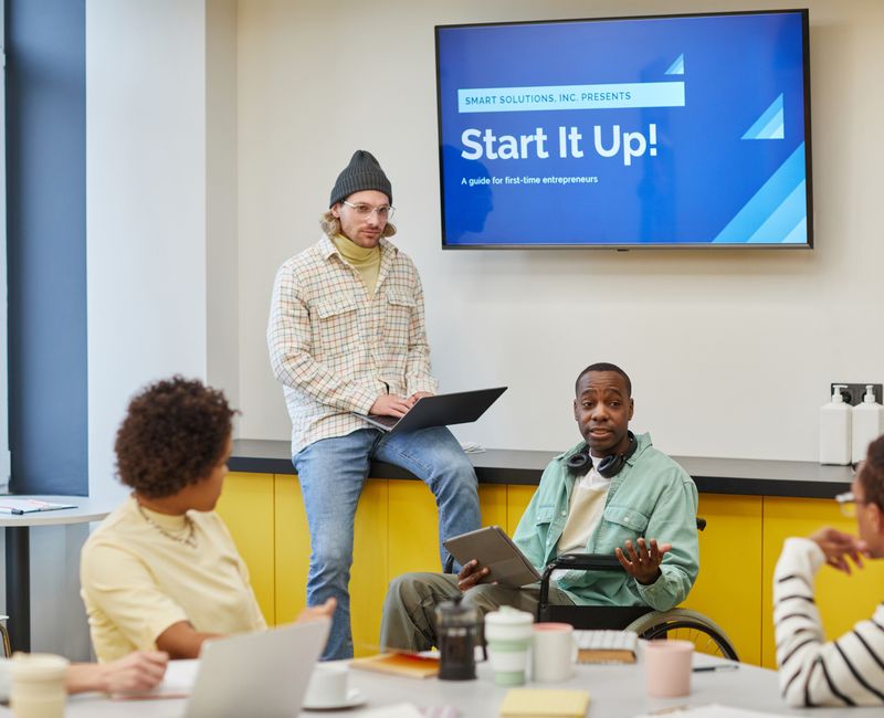 A diverse group of users engaging with mental health technology solutions in a supportive environment.