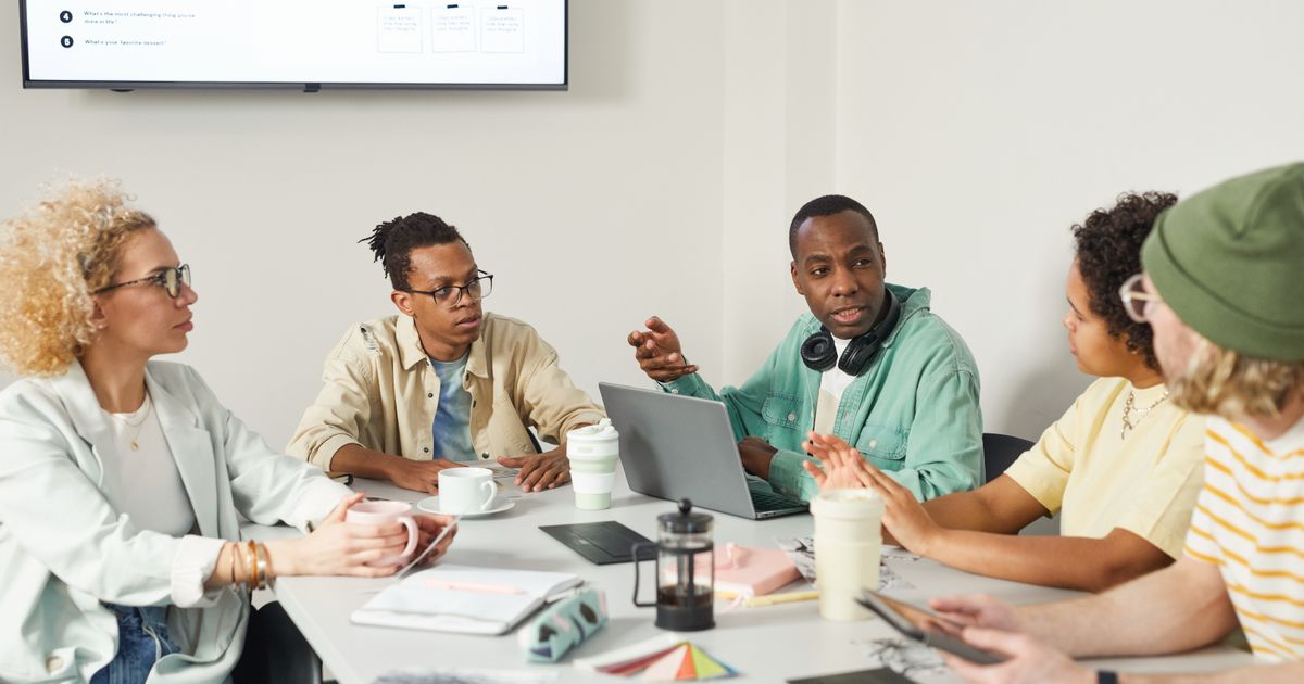 Candidates participating in a group discussion round