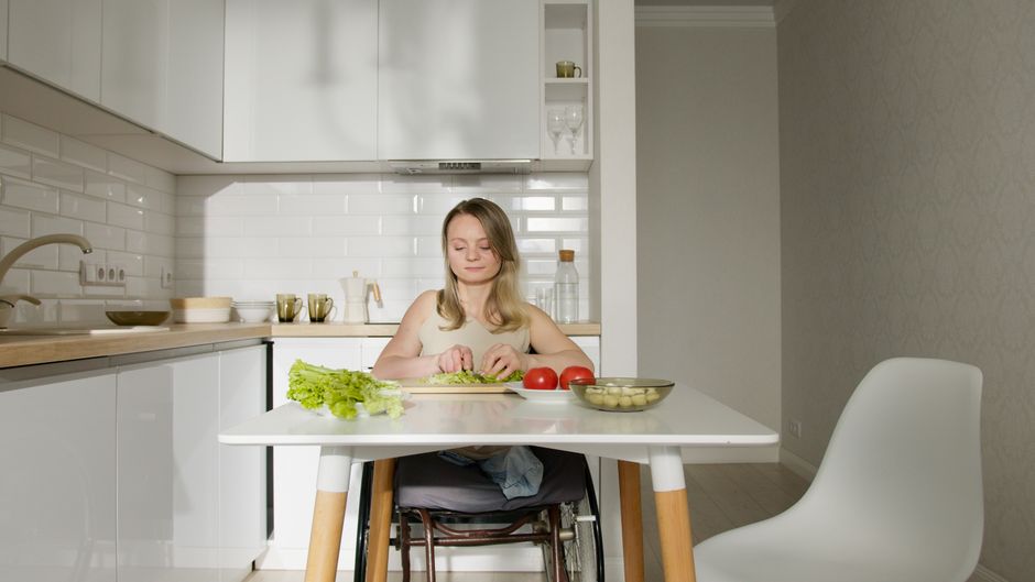 woman happy healthy kitchen cooking