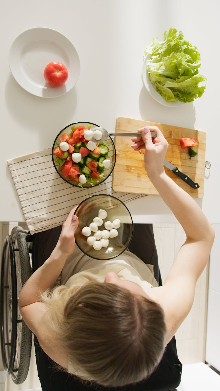 Overhead Shot Of A Woman Preparing Her Food 