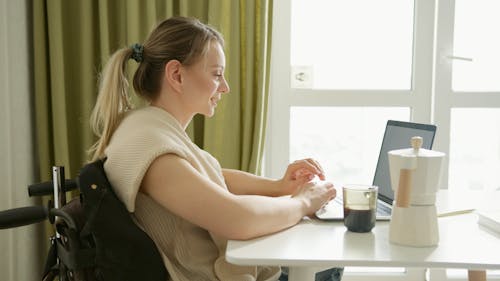 A Woman Working on Her Laptop 