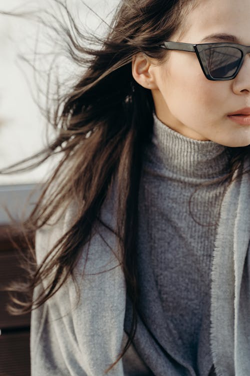 Woman in Gray Turtleneck Sweater and Black Sunglasses