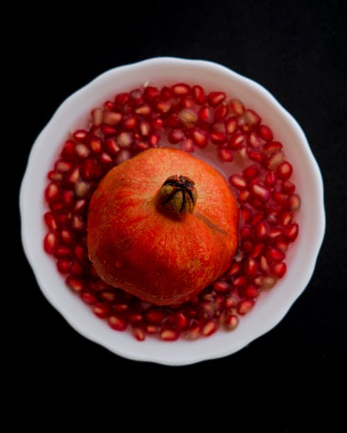 Foto profissional grátis de fechar-se, fruta, romã