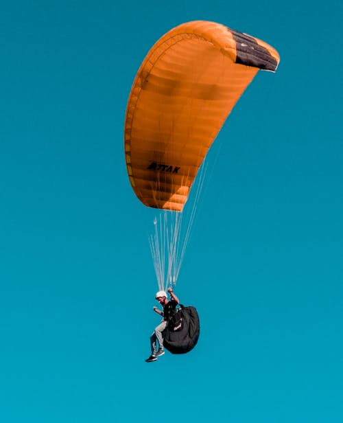 Gratis stockfoto met blauwe lucht, hangglider, hanggliding