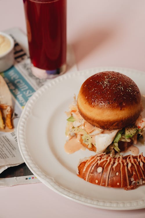 Free Lobster Burger on White Plate Stock Photo