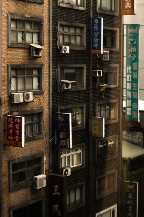Free Explore a Taiwanese cityscape with tall buildings and prominent signage, capturing urban life. Stock Photo