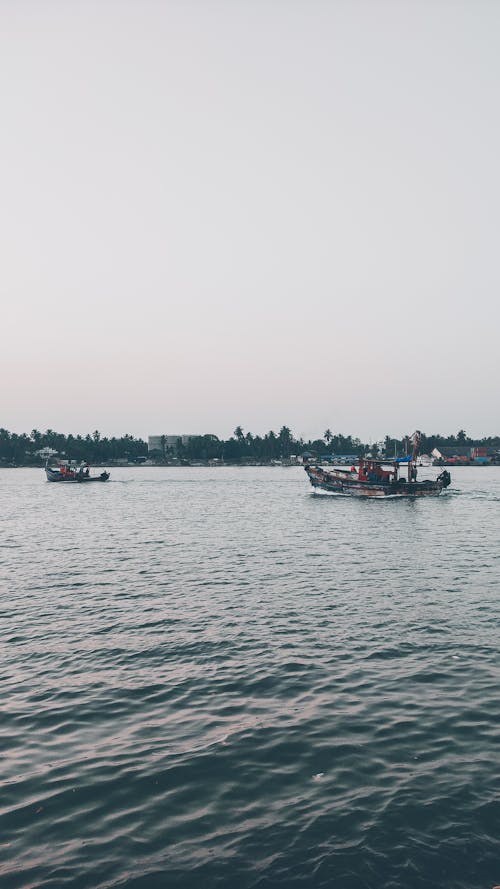 Photograph of Boats on a Sea