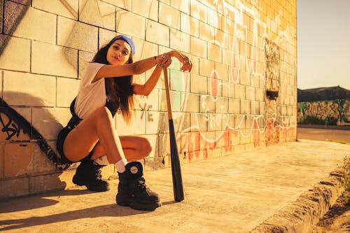 A Woman Holding a Baseball Bat