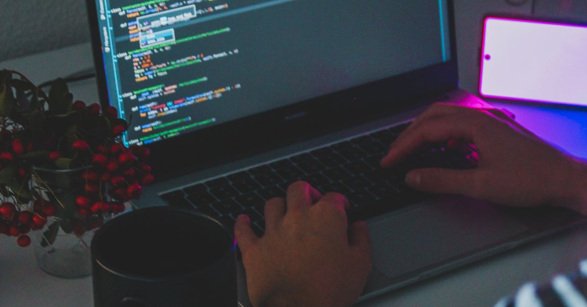 Computer Using Picture Close-Up Shot of a Person Using a Laptop Computer · Free Stock Photo