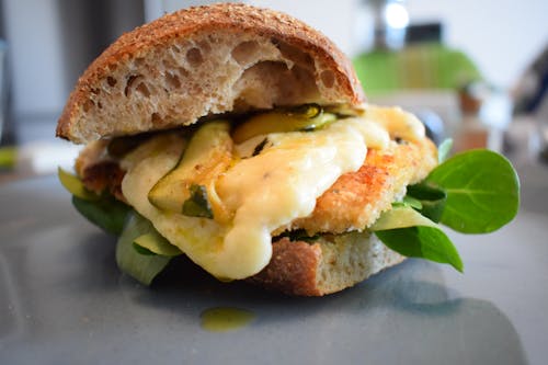 Free Bread With Green Vegetable and Melted Cheese Stock Photo